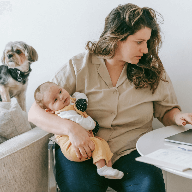 high-functioning-anxiety-therapy-working-mom-seattle.jpg Stressed mother with baby working on laptop, representing high-functioning anxiety in women — online anxiety therapy in Seattle.</p>
<p>